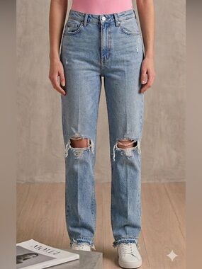 Distressed Blue Denim Jeans